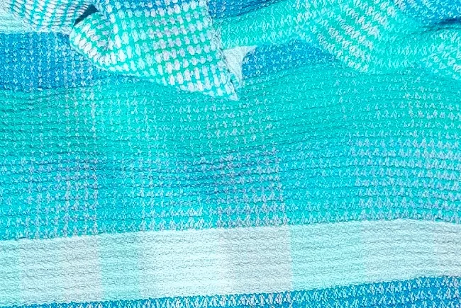 Linge de bain tissé, de couleur bleue-turquoise